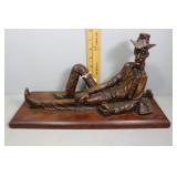 Signed Red Mill Reclining Cowboy Sculpture on Wood