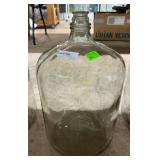 Six gallon clear water jug