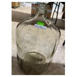 Six gallon clear water jug