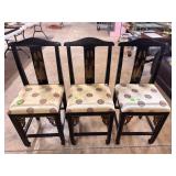 Three Chinese black lacqur side chairs with silk
