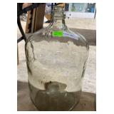 Six gallon clear water jug