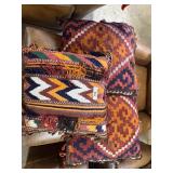 Three woven Native American throw pillows