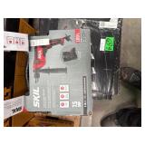 Skil cordless hammer drill in box, tested powers