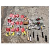 assortment of paint accessories; rollers; brushes