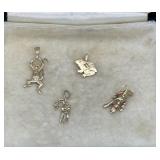 FOUR 14KT ANIMAL CHARMS (GIRAFFE, DOG, MONKEY,