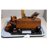 Five antique wood working planes