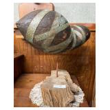 Primitive folk art wooden sculpture with copper ba