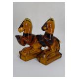 Imperial Art glass horse bookends in amber