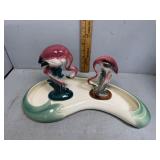 Two flamingo figures in ceramic wading dish