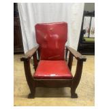 Morse chair in oak with animal carved arm rest and