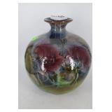 Floral pottery bulbous vase in muted tones