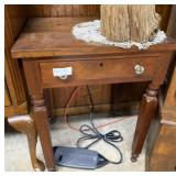 Walnut single drawer side table with glass pulls -