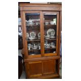 Oak display cabinet, beveled glass sliding uppers,