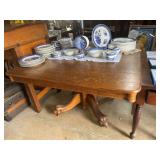 Tiger Oak Dining table with pedestal base with paw