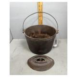 Cast iron bale handled cook pot marked 8B & a sad