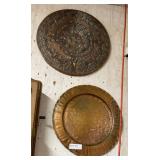 Two copper chargers - Aztec & Floral round hammere