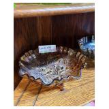 Two iridescent carnival glass floral pedestal dish