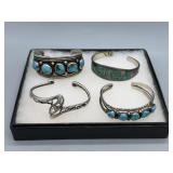 Four 800 silver cuff bracelets with Native America