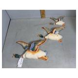 Three series grouping occupied Japan wall ducks in