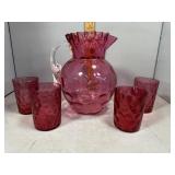 Cranberry water pitcher with four glasses