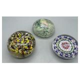 Three art glass paperweights