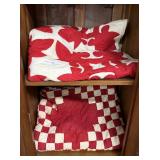 Two hand stitched red and white quilts circa early