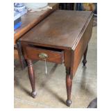 Walnut drop leaf table with single drawer
