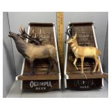 Two Olympia Beer resin advertising wall plaques wi