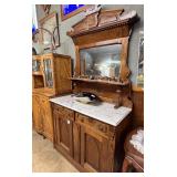 Burl wood stepback cabinet with crown and brass pu
