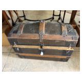 Camelback truck with metal wrap, wooden straps & o