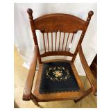 Oak arm chair with needlepoint seat and custom car
