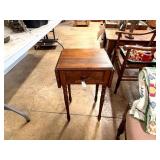 Single-drawer dropleaf sewing table with turned sp