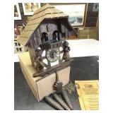 VINTAGE GERMAN CUCKOO CLOCK W/ MANUAL (NOT TESTED)