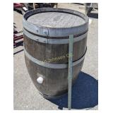 WINE BARREL USED AS A TABLE BASE