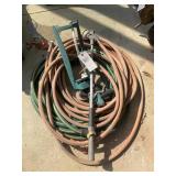 GROUP OF HOSES AND SPRINKLERS