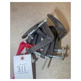 GROUP OF SMALL U CLAMPS
