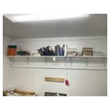 SHELF CONTAINING MISC MANUALS AND AUTO SERVICE/REP