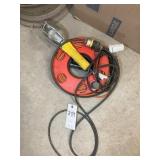 GROUP INCLUDING EXTENSION CORD ON REEL AND WORK LI