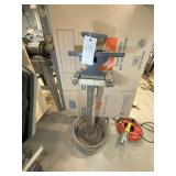 METAL ANVIL ON HOME MADE PEDESTAL AND SMALL ANVIL.