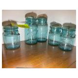 GROUP OF BLUE BALL MASON JARS WITH GLASS LIDS