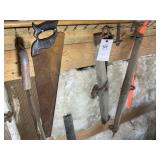 TOOLS ON WALL, HAND SAWS, SINGLE TREES, ETC