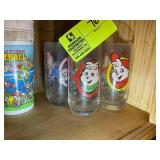 SHELF OF CHIPMUNKS GLASSES AND OTHER PLASTIC CUPS