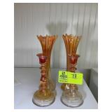 GROUP OF ORANGE CARNIVAL GLASS CANDLE HOLDERS AND