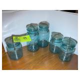 GROUP OF BLUE BALL MASON JARS WITH GLASS LIDS