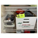 BOX WITH EXTENSION CORDS AND TUB OF BATTERIES