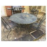 WROUGHT IRON PATIO TABLE 48 IN DIAMETER AND 4 CHAI