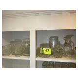 TOP SHELF WITH MISC CLEAR GLASSWARE, CANDY DISHES,
