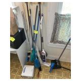 GROUP OF BROOMS, MOPS, AND DUSTERS