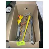 BOX WITH RACKETS AND LAWN DARTS