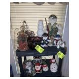 TOP TWO SHELVES OF CHRISTMAS THEMED ITEMS